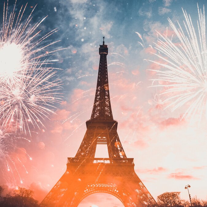 Eiffel Tower in Paris with fireworks in the background | © shutterstock_2084453479